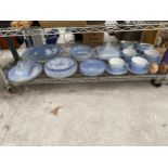 A LARGE ASSORTMENT OF CERAMIC WARE TO INCLUDE MAINLY BLUE AND WHITE PLATES, CUPS AND SAUCERS AND