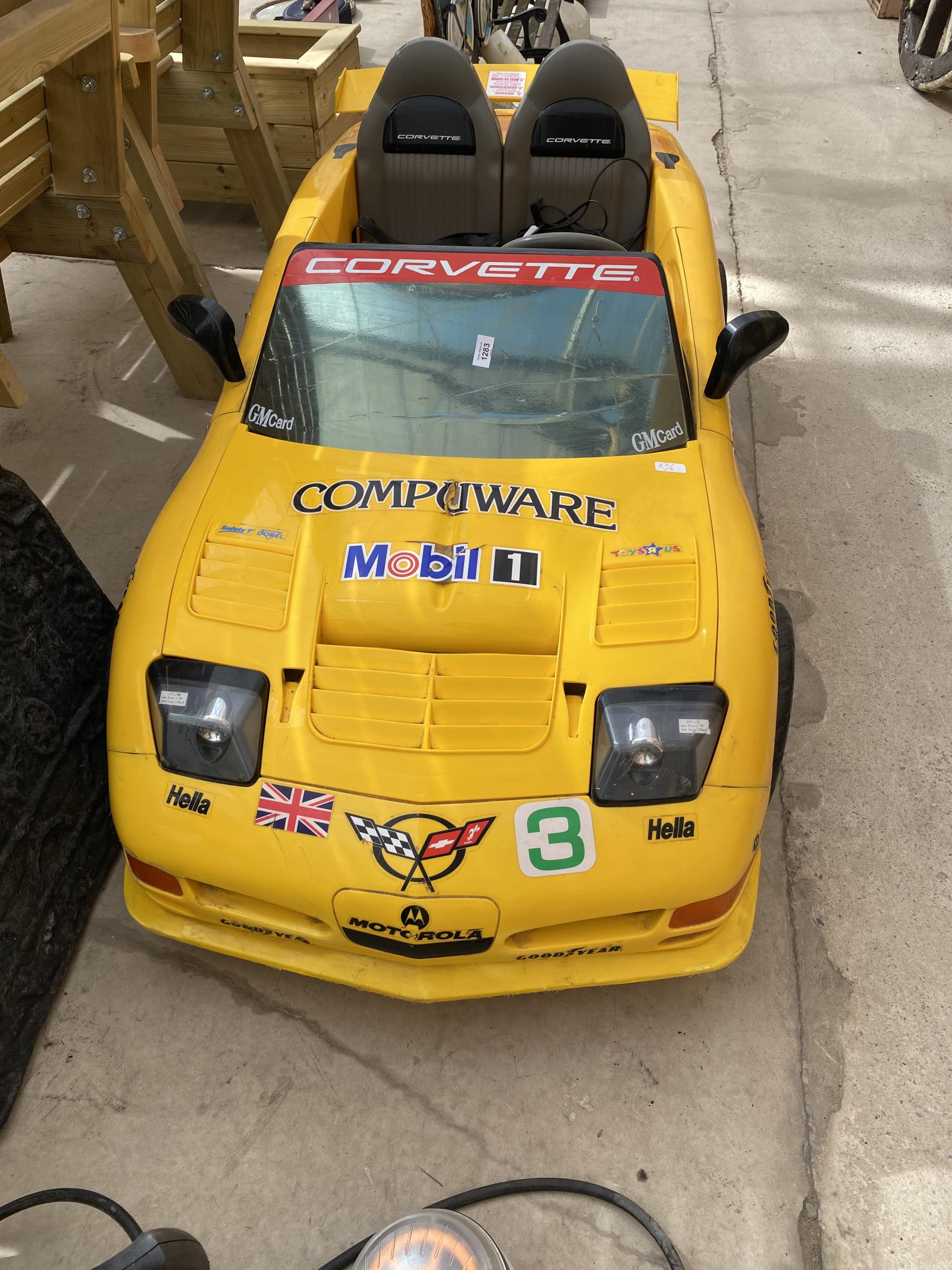 A CHILDRENS BATTERY POWERED RIDE ON CORVETTE CAR WITH CHARGER - Image 4 of 4