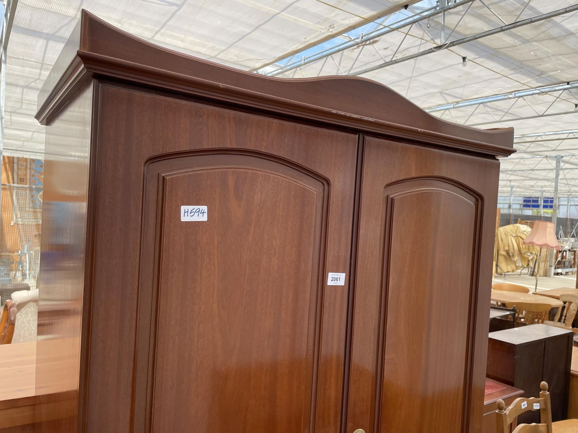 A MODERN MAHOGANY EFFECT TWO DOOR WARDROBE HAVING TWO DRAWERS TO THE BASE, 36"WIDE - Image 2 of 3