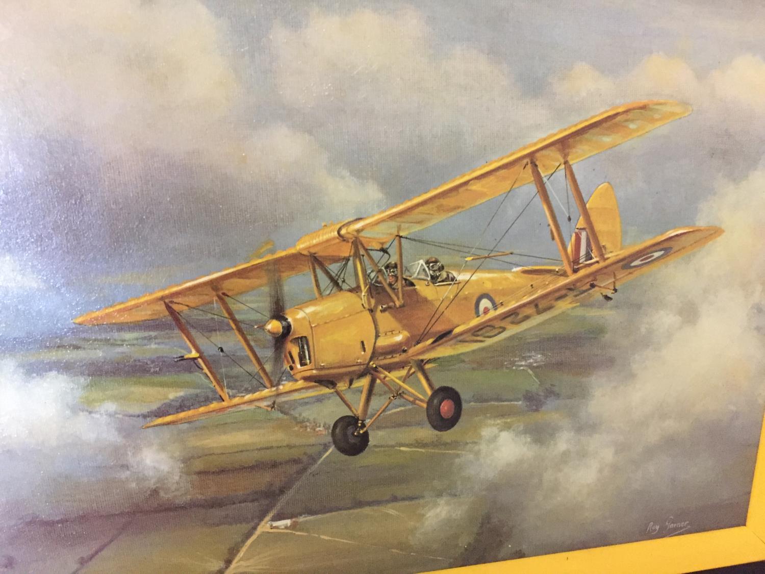 A FRAMED COLOURED CANVAS PRINT OF A BIPLANE - Image 2 of 3