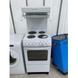 A WHITE NEWWORLD FREE STANDING COOKER WITH HOB AND GRILL