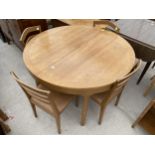 AN OAK NATHAN EXTENDING DINING TABLE, 47" DIA AND FOUR CHAIRS