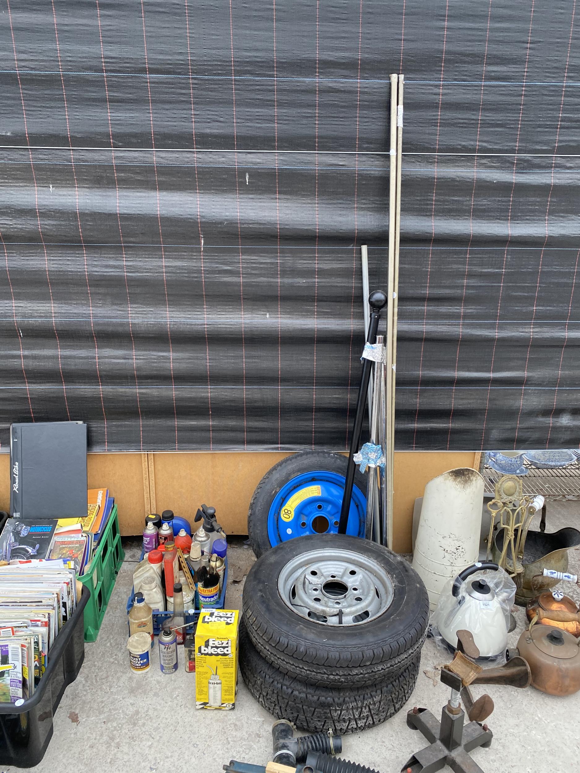AN ASSORTMENT OF ITEMS TO INCLUDE CAR WHEELS, JACKS AND OIL CANS ETC