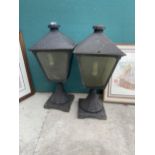 A PAIR OF DECORATIVE OUTSIDE LIGHTS