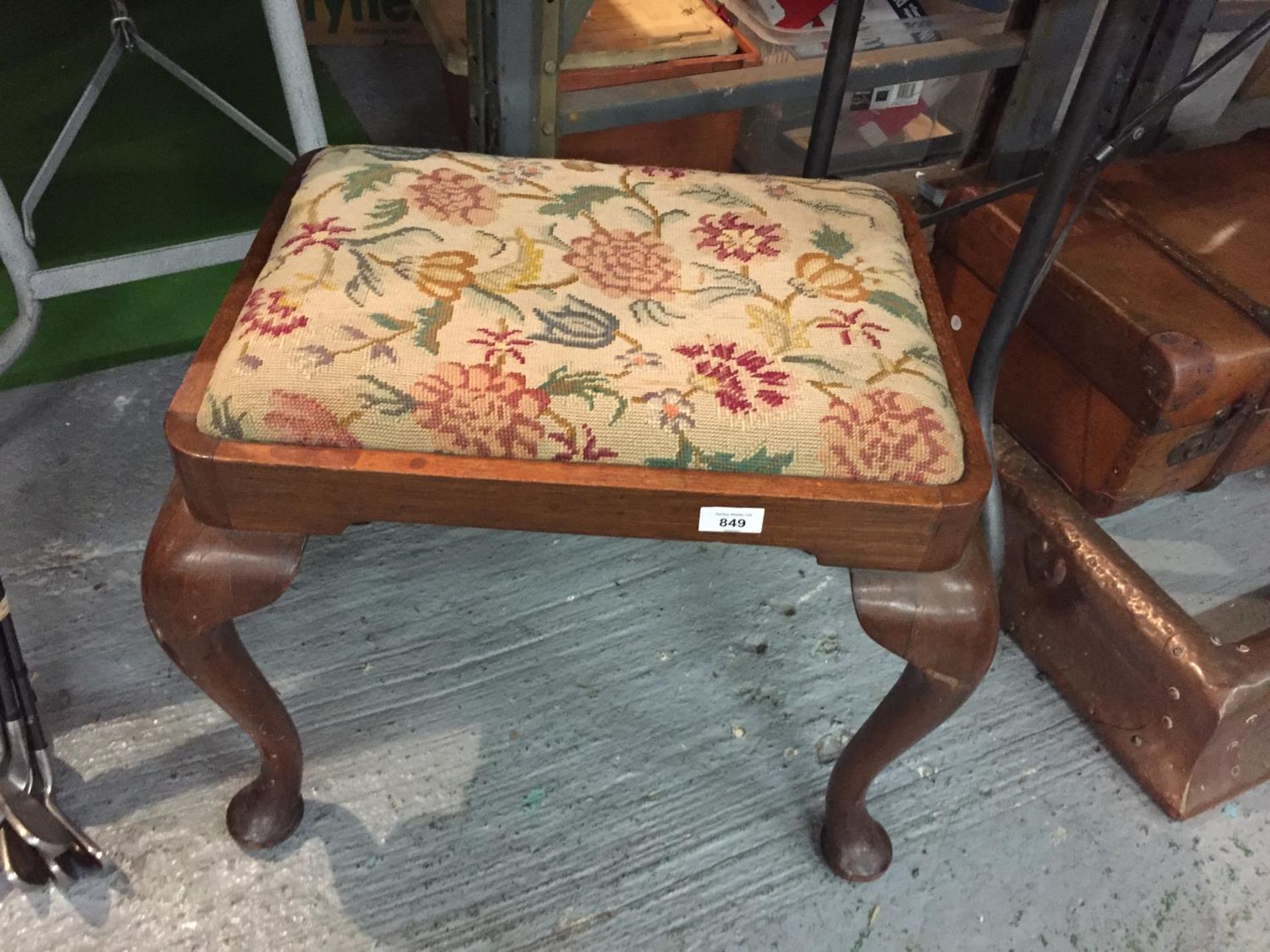 A DRESSING TABLE STOOL WITH A FLORAL TAPESTRY SEAT ON CABRIOLE LEGS