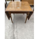 A MODERN DROP LEAF COFFEE TABLE