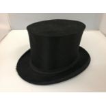 A VINTAGE FRENCH OPERA COLLAPSIBLE SATIN TOP HAT