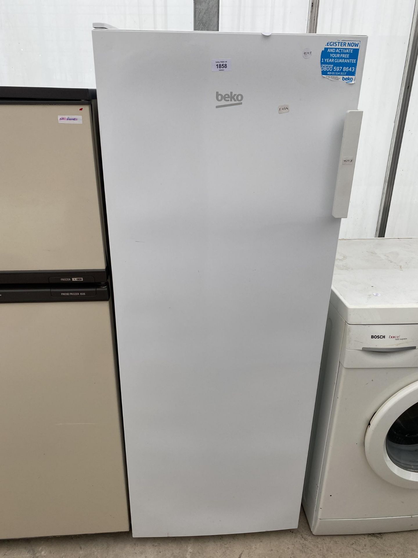 A WHITE BEKO UPRIGHT FREEZER