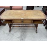 A REPRODUCTION MAHOGANY COFFEE TABLE WITH INSET LEATHER TOP WITH LYRE ENDS