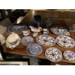 A QUANTITY OF BLUE AND WHITE CERAMICS TO INCLUDE JUGS PLATES TUREENS ETC