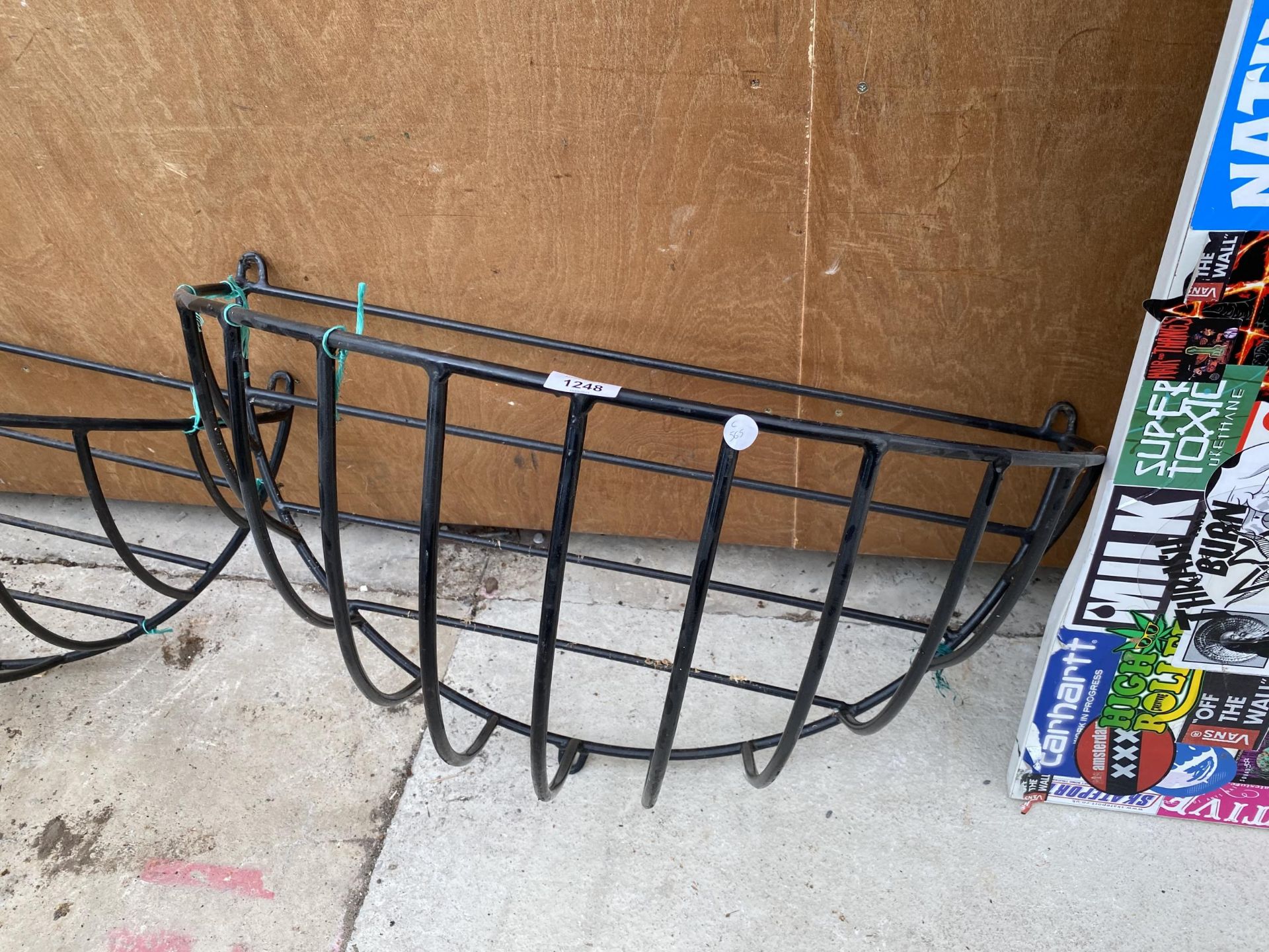 A PAIR OF WROUGHT IRON WALL HANGING HAY RACKS - Image 2 of 4