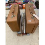 A PAIR OF VINTAGE TRAVEL CASES AND AN ASSORTMENT OF WALKING STICKS