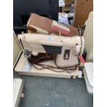 A RETRO SINGER SEWING MACHINE WITH CARRY CASE