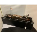 A WOODEN GHOST LIFE BOAT LENGTH 60CM WITH TURNING HANDLE