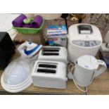 AN ASSORTMENT OF ITEMS TO INCLUDE A KETTLE, RUSSELL HOBBS BREAD MAKER AND TOASTERS ETC