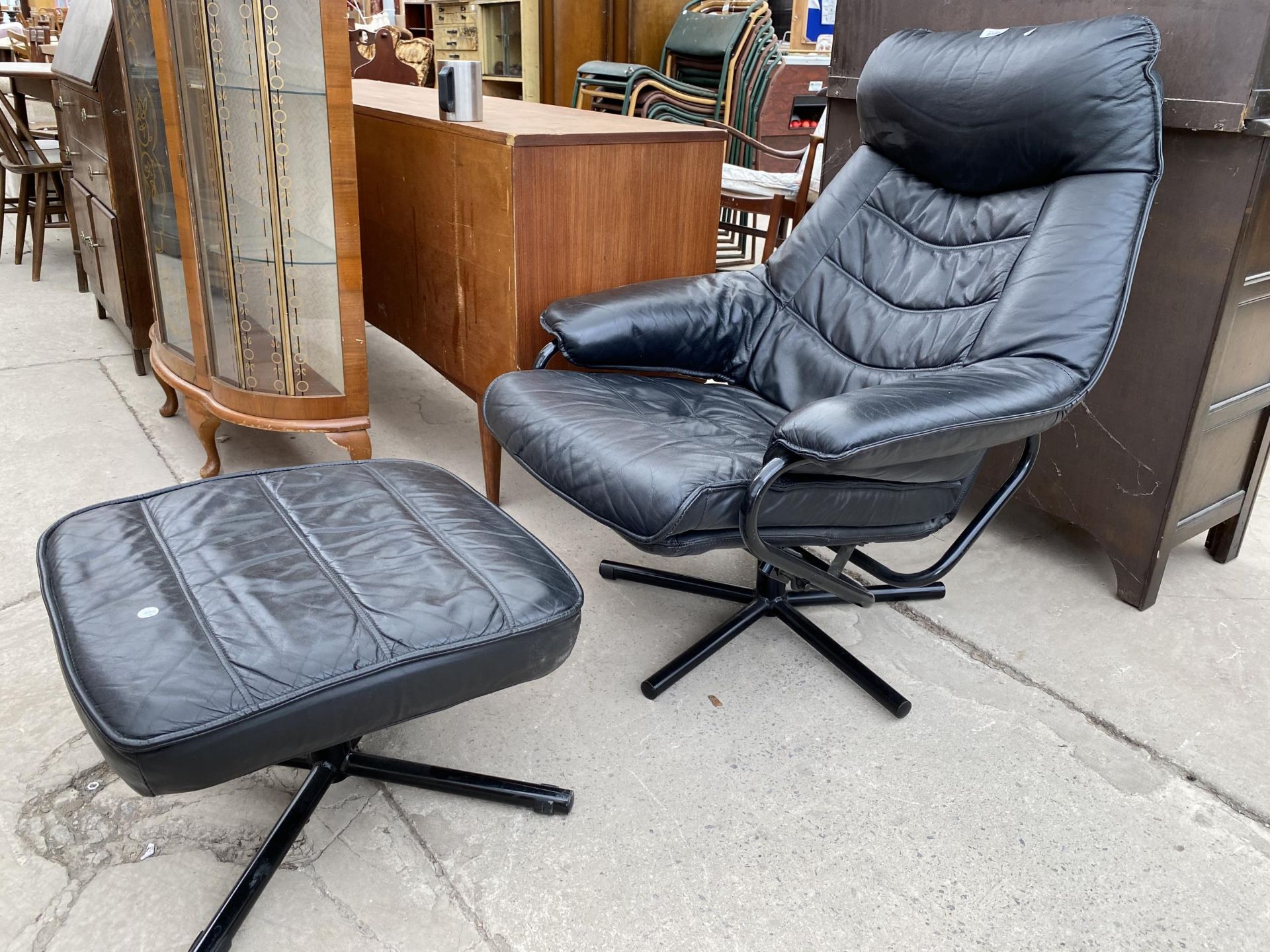 A MODERN FAUX BLACK LEATHER ADJUSTABLE EASY CHAIR AND MATCHING STOOL - Image 2 of 3