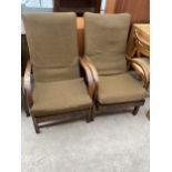 A PAIR OF ART DECO STYLE FIRESIDE CHAIRS