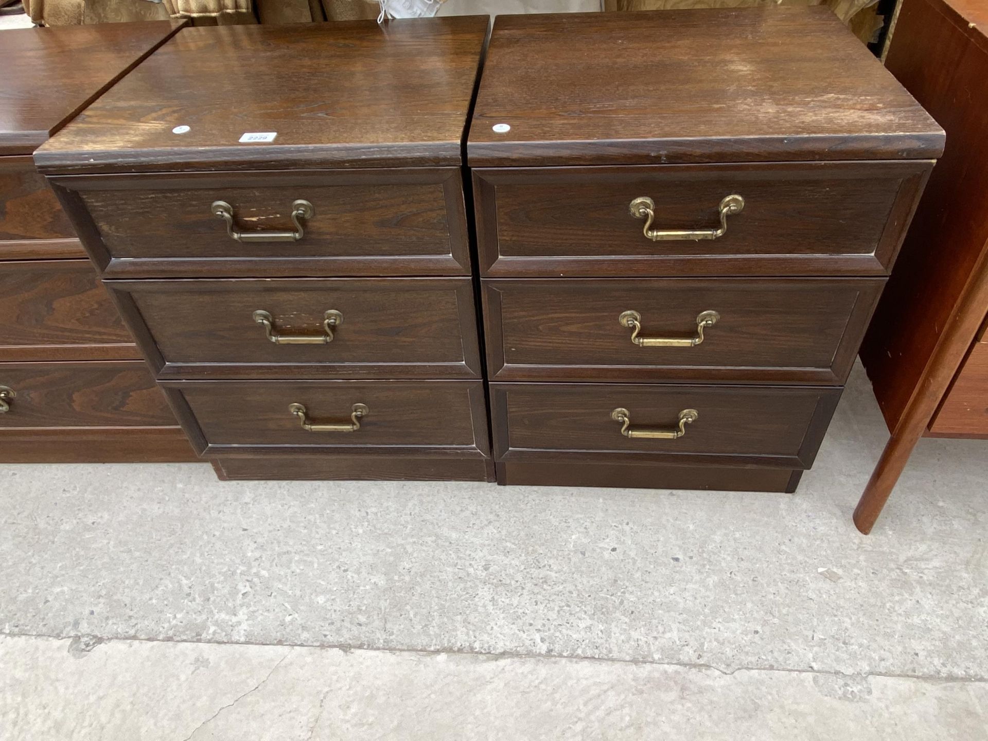 A PAIR OF G PLAN THREE DRAWER BEDROOM CHESTS 20" WIDE