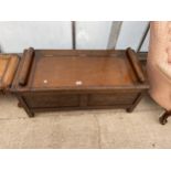 A 20TH CENTURY OAK VICTORIAN STYLE CARVED BLANKET CHEST/SEAT, WITH ROLLING PIN ARMS 42" WIDE