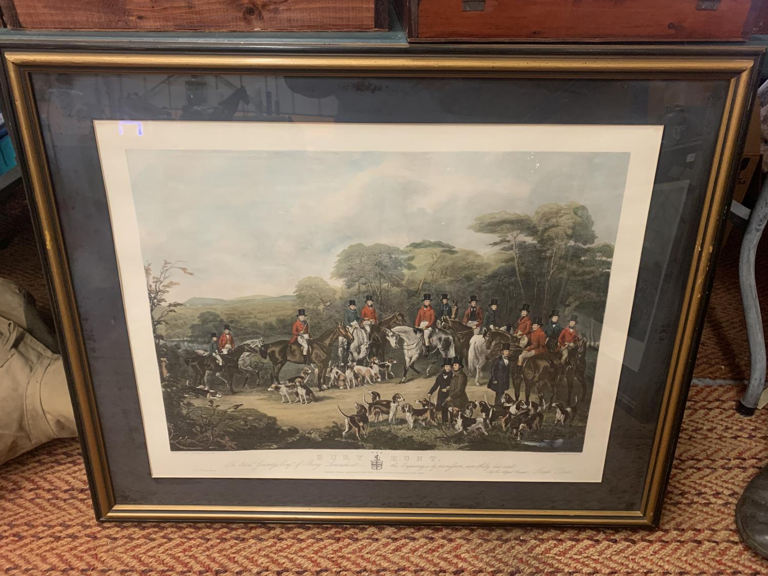 A FRAMED COLOURED ETCHING OF THE BURY HUNT