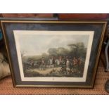 A FRAMED COLOURED ETCHING OF THE BURY HUNT