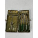 A VINTAGE CASED NAIL SET MARKED R.M.S AURANIA