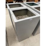 TWO LARGE GREY PLASTIC PLANTERS