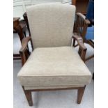 A PARKER KNOLL FIRESIDE CHAIR MODEL NUMBER P.K.731