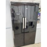 A BLACK BEKO AMERICAN STYLE FRIDGE FREEZER