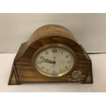 AN EIGHT DAY MANTLE CLOCK DECORATED WITH A DEATH OR GLORY MILTARY BADGE