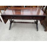 A REPRODUCTION MAHOGANY AND INLAID LOW SOFA STYLE TABLE