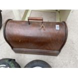 A VINTAGE SINGER SEWING MACHINE WITH WOODEN CARRY CASE