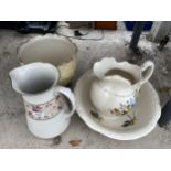 AN ASSORTMENT OF CERAMIC WARE TO INCLUDE A MATCHING JUG AND WASH BOWL, A FURTHER JUG AND A PLANTER