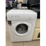 A WHITE HOTPOINT TUMBLE DRYER