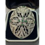 AN 18 CARAT WHITE GOLD DIAMOND AND EMERALD COCKTAIL RING GROSS WEIGHT 13.2 GRAMS SIZE O/P