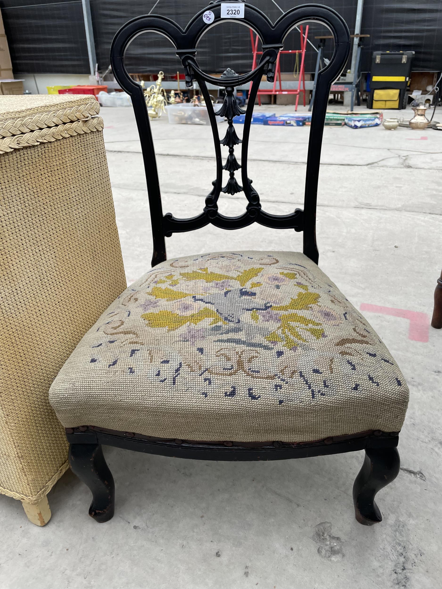 AN EBONISED NURSING CHAIR AND LLOYD LOOM STYLE OTTOMAN - Image 2 of 3