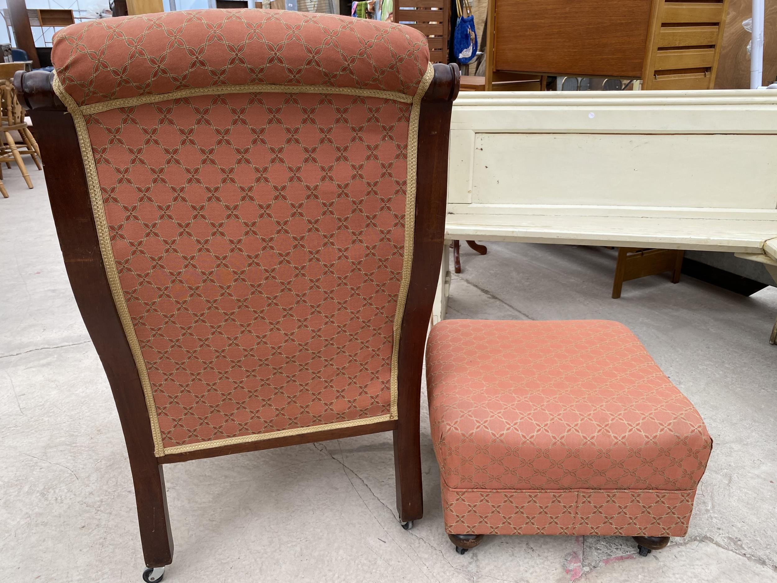 A VICTORIAN MAHOGANY FIRESIDE CHAIR WITH TURNED UPRIGHTS AND FRONT LEGS WITH LATER STOOL HAVING - Image 6 of 6