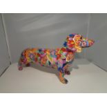 A 'GROOVY ART' DACHSHUND