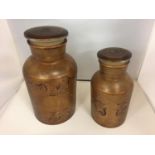 TWO VINTAGE DECORATED AMBER CLASS CONTAINERS WITH LIDS