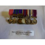 A MINIATURE MEDAL GROUP AWARDED TO MAJOR REGINALD WALLACE M.B.E. ROYAL TANK REGIMENT