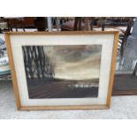 A FRAMED PRINT OF A LAKE SCENE