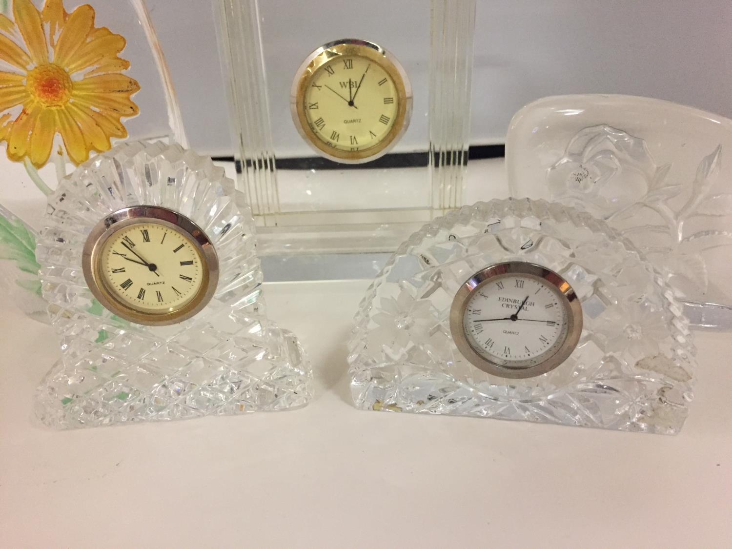 A NUMBER OF CUT GLASS ITEMS TO INCLUDE THREE SMALL CLOCKS AND TWO PAPER WEIGHTS - Image 3 of 4