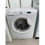 A WHITE HOOVER VISIONTECH WASHING MACHINE