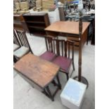 AN EARLY 20TH CENTURY OAK BARLEY TWIST GATE LEG DINING TABLE, A STANDARD LAMP, TWO DINING CHAIRS AND