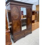 AN EDWARDIAN MAHOGANY MIRROR DOOR WARDROBE WITH TWO DRAWERS TO BASE, 64" WIDE