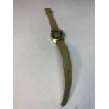 A TWA WRISTWATCH WITH BEIGE LEATHER STRAP