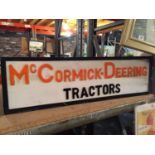 A McCORMICK-DEERING TRACTORS ILLUMINATED SIGN