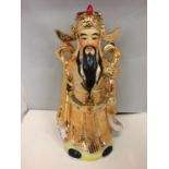 A LARGE PORCELAIN GOLDEN ORIENTAL EMPEROR