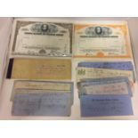 A QUANTITY OF BANKERS DRAUGHTS, CHEQUE STUBS 1860'S - 1910 AND TWO SHARE CERIFICATES NEW YORK 1969