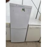 A WHITE CANDY UPRIGHT FRIDGE FREEZER